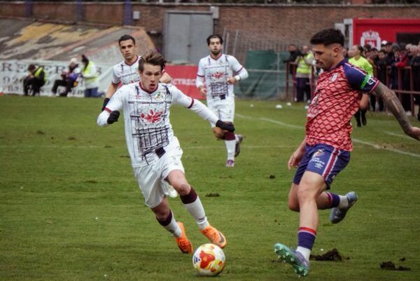 Jugadores del Salamanca UDS en un partido contra el CD Numancia
