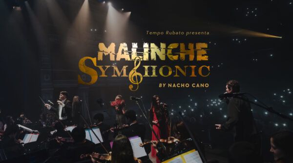 Presentación de Malinche Symphonic por Nacho Cano en un escenario iluminado.