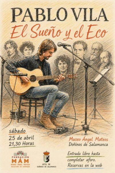Pablo Vila tocando la guitarra en un concierto en Doñinos de Salamanca