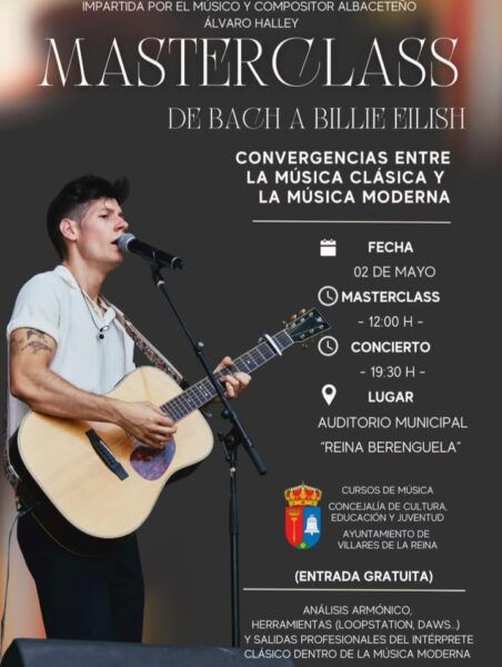 Músico en concierto durante una masterclass gratuita en el aula de música.